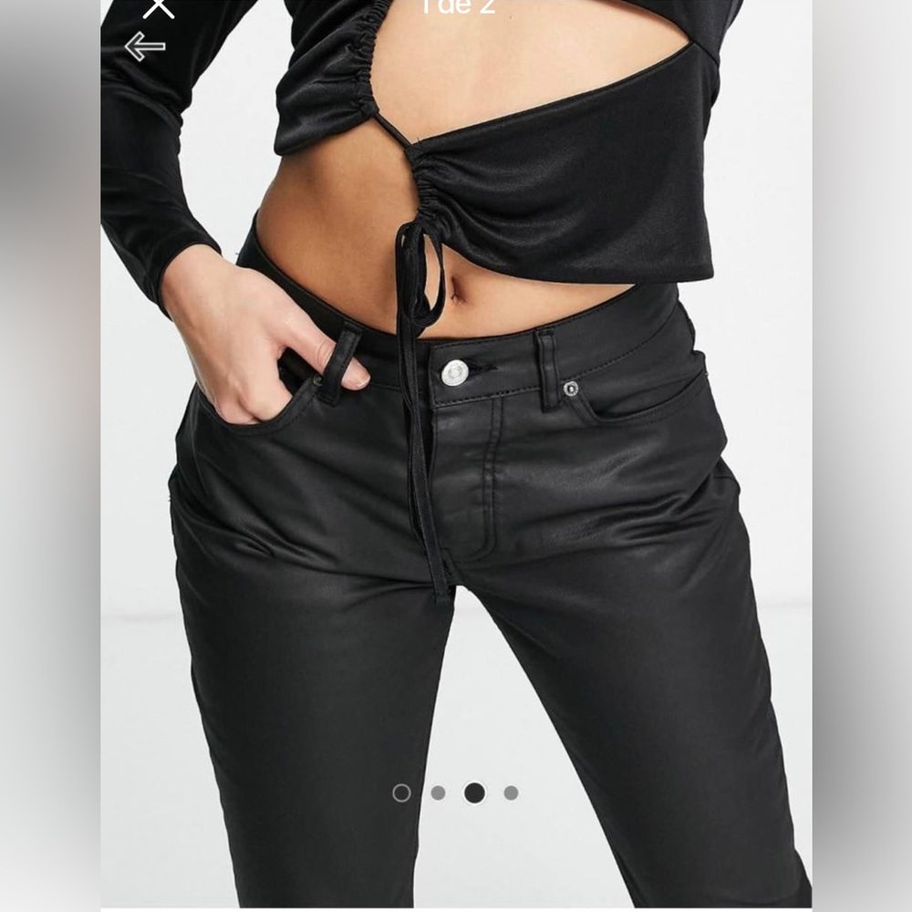 Black coated flare jeans
